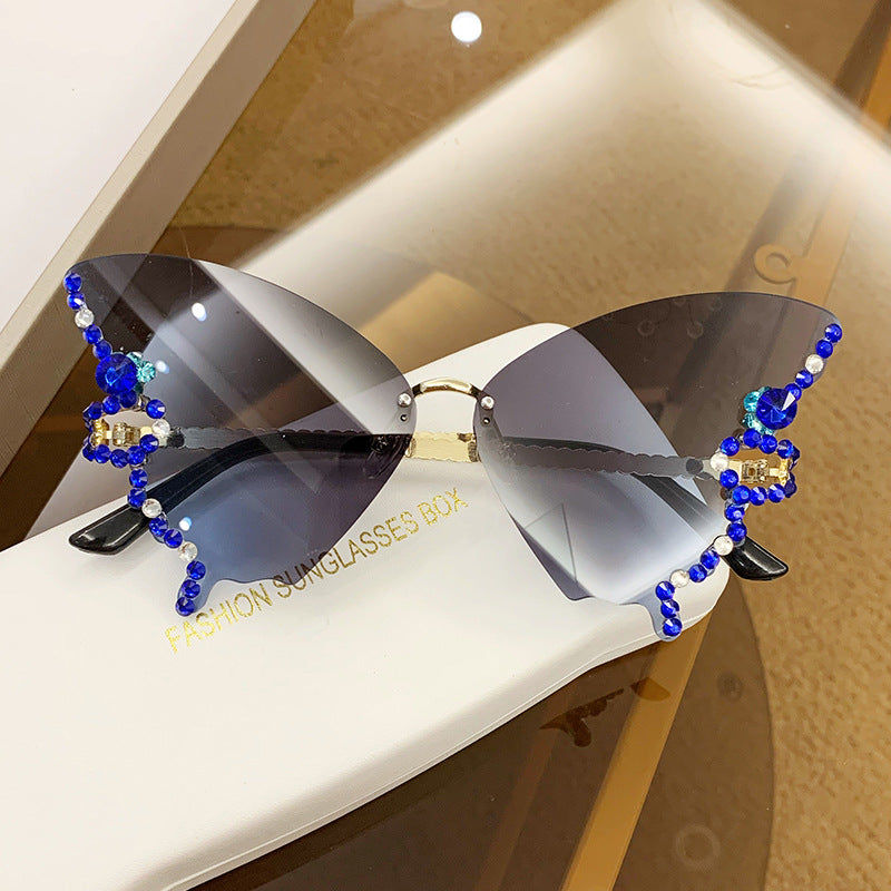 Gafas de sol de PC sin borde de diamante de forma de mariposa al por mayor